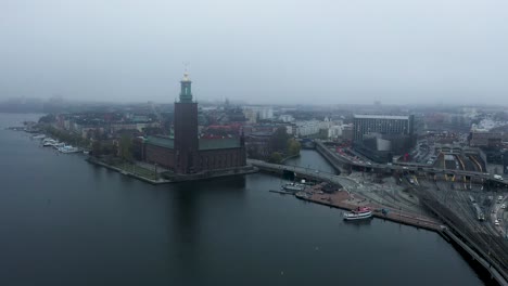 Aerial-footage-panning-about-the-Stockholm-City-Hall-on-a-cloudy-afternoon