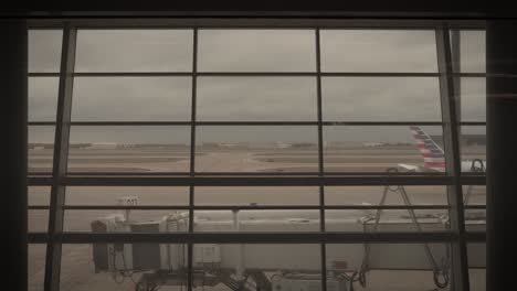 Time-lapse-shot-of-traffic-on-runway-during-cloudy-day-at-Dallas-Fort-Worth-International-Airport