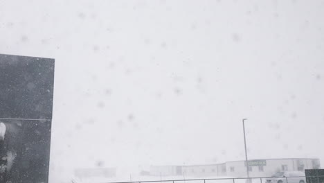 Window-View-of-Snowstorm-in-Bismarck,-ND