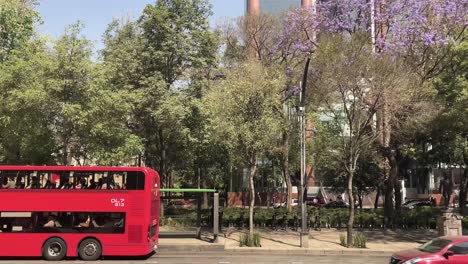 slow-motion-shot-of-paseo-de-la-reforma-avenue-and-the-historical-buildings-of-the-city