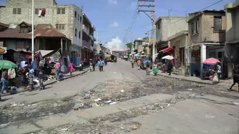 People-walking-in-the-streets-of-Port-au-Prince,-Haiti