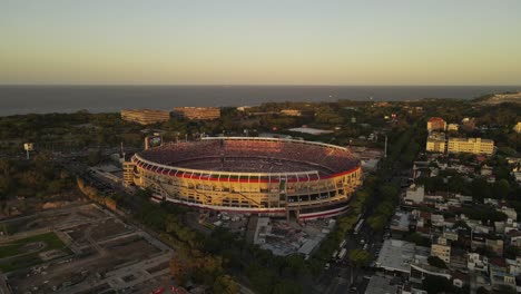 Drone-flight-overlooking-the-buenos-aires-football-stadium-during-a-match