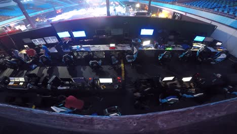 Hyper-lapse-Aerial-View-Of-People-Doing-Backstage-Live-Stream-Setup-For-An-Event