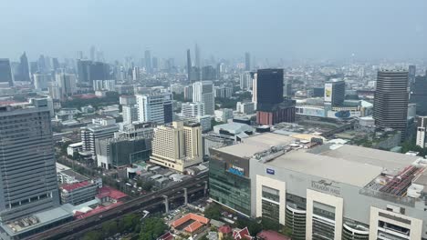 Hazy-pollution-of-the-panoramic-aerial-view-of-the-Bangkok-Buildings,-Thailand-cityscape