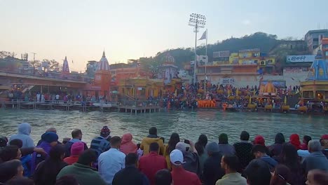 people-gathered-at-ganges-aarti-religious-pryer-at-evening-at-river-bank-video-is-taken-at-har-ki-pauri-haridwar-uttrakhand-india-on-Apr-15-2023