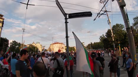 Crowd-of-people-on-street-in-Bulgaria-with-flags-at-anti-government-protest