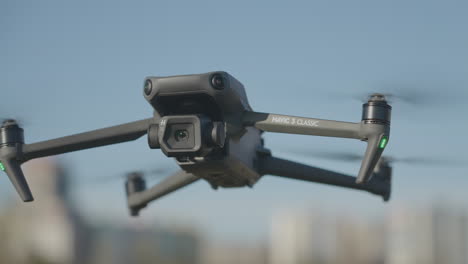 Close-Up-of-DJI-Mavic-3-Classic-Drone-Hovering-in-the-Air