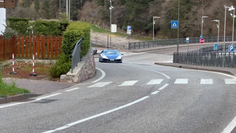 Lamborghini-police-sports-car-in-Italy-driving-on-a-road