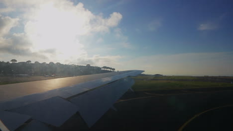 Airplane-wing-with-São-Migel's-island-in-the-Azores-on-the-background