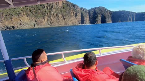 Bruny-Island,-Tasmania,-Australia---15-March-2019:-Two-tourist-boats-near-rocky-outcrops-of-Bruny-Island-Tasmania