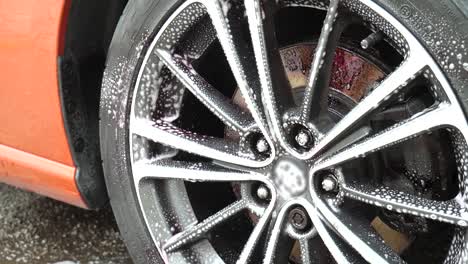 Iron-remover-solution-reacting-slowly-on-a-gt-car-rim-wheel