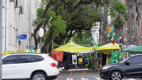 Supporters-of-the-ex-president-Jair-Bolsonaro-camp-in-front-of-the-Army-Head-Quarters-of-Porto-Alegre,-Brazil,-in-protest-asking-for-federal-intervention-after-Lula's-presidential-election