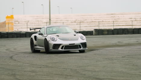 Sport-car-over-steering-and-drifting-on-a-track-in-slow-motion