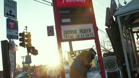 A-sign-counts-down-the-days-until-the-George-Floyd-trial-in-the-neighborhood-where-he-was-killed-by-Minneapolis-police-officers-in-May-2020