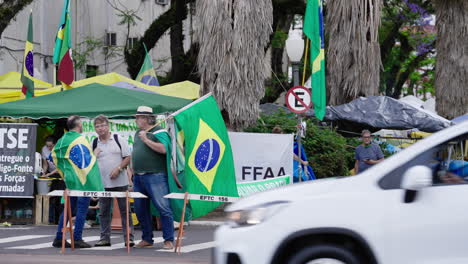 Supporters-of-ex-Brazilian-president-Bolsonaro-camp-in-front-of-the-Army-Head-Quarters-of-Porto-Alegre,-Brazil,-in-protest-asking-for-federal-intervention-after-Lula's-presidential-election