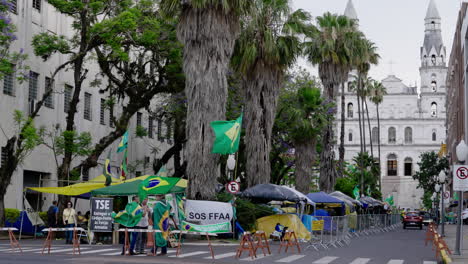 Supporters-of-Brazilian-ex-president-Bolsonaro-camp-in-front-of-the-Army-Head-Quarters-of-Porto-Alegre,-Brazil,-in-protest-asking-for-federal-intervention-after-Lula's-presidential-election