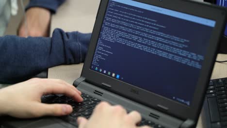 Hands-typing-code-on-a-computer