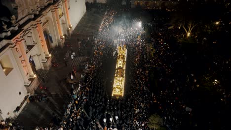 Aerial-View-Of-Crowded-People-And-Wooden-Float-During-Easter-Sunday-Celebration-In-The-City-Of-Antigua,-Guatemala
