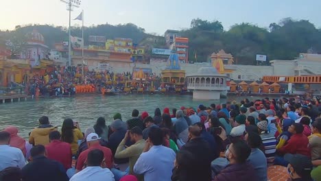 people-gathered-at-ganges-aarti-religious-pryer-at-evening-at-river-bank-video-is-taken-at-har-ki-pauri-haridwar-uttrakhand-india-on-Apr-15-2023