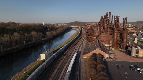 An-aerial-view-of-parked-cargo-trains-in-Bethlehem,-Pennsylvania-on-a-sunny-day