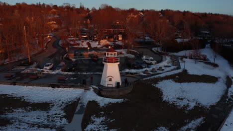 Scenic-aerial-view-of-a-lighthouse-at-sunset