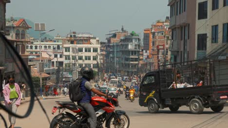 Cityscape-view-of-a-trafficated-street-in-the-busy-city-of-Kathmandu,-Nepal