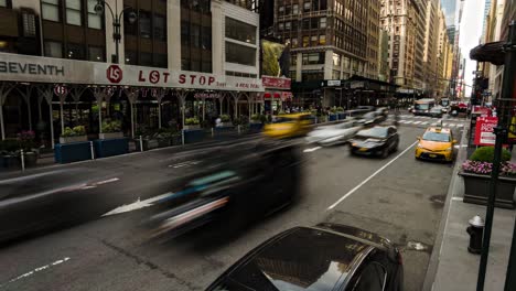 timelapse-and-motionlapse-from-7th-Ave,-New-York,-movement-of-people-and-vehicles-in-the-center-of-an-iconic-city