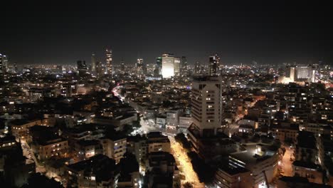 Vista-Nocturna-De-Los-Rascacielos-De-Tel-Aviv-Desde-El-Mar-Mediterráneo