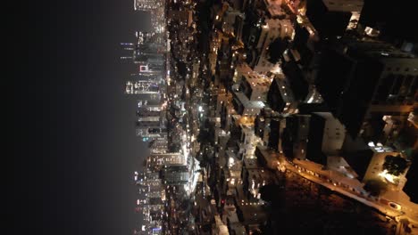 Vista-Nocturna-De-Los-Rascacielos-De-Tel-Aviv-Vista-Del-Tráfico-Desde-Los-Tejados-De-La-Metrópolis-Moderna