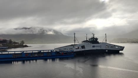 Worlds-first-Hydrogen-ship-HYDRA-entering-Dry-dock-for-maintenance-in-Westcon-Olensvag-Norway---Early-spring-morning-with-fog-and-snowy-weather