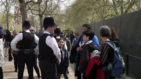 4-May-2023---London-Metropolitan-Police-Officers-Talking-To-Tourists-At-The-Mall-During-The-Preparation-For-King-Charles-Coronation-Ceremony