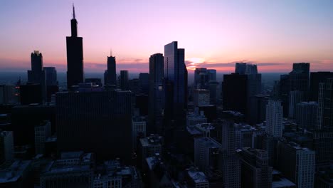 Sunset-Aerial-of-Chicago-skyline,-Willis-Tower