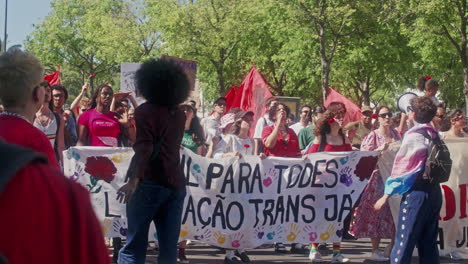 April-25th-parade-at-Avenida-da-Liberdade,-Lisbon,-close-up-shot-of-Trans-Rights-Activists