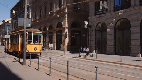Yellow-Tram-On-Old-Tramway-In-The-City-Of-Milan-In-Italy-In-Daylight