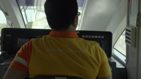 Singapore-Sentosa-Monorail-worker-driver-begin-to-work-train-metro-subway