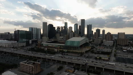 Aerial-view-around-the-Minute-maid-park-stadium,-cloudy-sunset-in-Houston,-USA