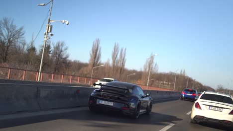 Slow-Motion-Porsche-GT-cruising-on-the-highway