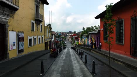 Aerial-view-low-over-streets-of-Orizaba,-cloudy-day-in-Veracruz,-Mexico