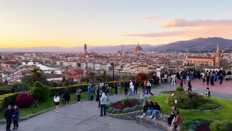 Panorama-of-Florence-at-sunset-from-Piazzale-Michelangelo-with-tourists-walking