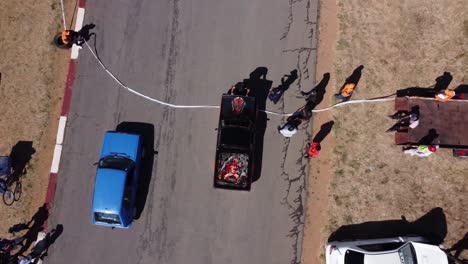 Drone-video-of-a-drag-race-competition-in-Bulawayo,-Zimbabwe