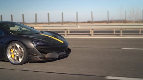 Man-in-McLaren-speeding-on-highway