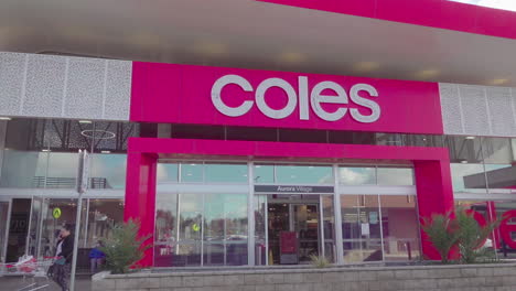 Slow-pan-of-exterior-design-of-Coles-shopping-district