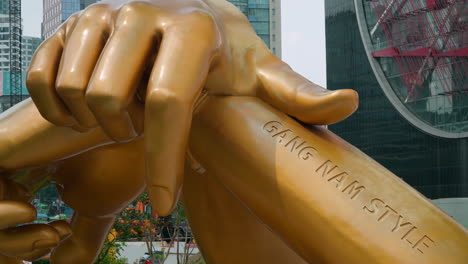 Closeup-Of-Statue-Of-Gangnam-Style-At-The-East-Gate-Of-COEX-In-Gangnam,-Seoul,-South-Korea