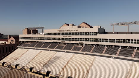 University-of-Colorado,-Boulder-USA,-Drone-Shot-of-Folsom-Field-Stadium-Empty-Stands-and-Gallery-on-Hot-Sunny-Day
