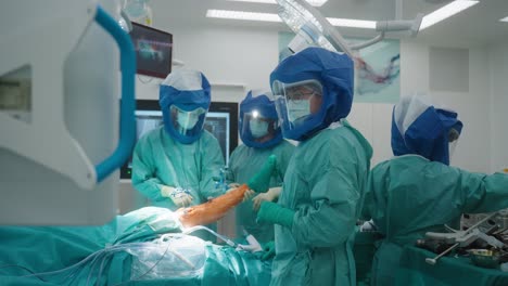doctors-look-at-the-monitor-during-the-operation