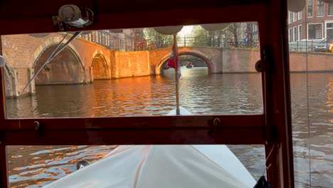 Private-canal-cruise-with-locals'-boat-in-Amsterdam