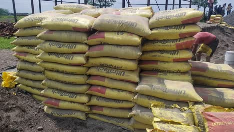 Pile-of-Cement-in-bags,-stacked-for-a-construction-project