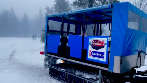 MonTraGo-driving-over-the-snow-in-Pec-Pod-Snezkou,-Czech-Republic