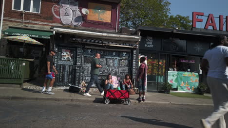 Wide-shot-of-Kensington-Market-vendors-and-busy-street-life