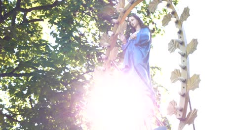Sunshine-over-the-figurine-of-the-Virgin-Mary-in-the-park-in-Gietrzwałd